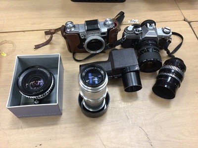 Lot 829 - Cameras and accessories, including Canon AT-1, two Zeiss lenses, various filters, etc