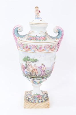 Lot 18 - Good 19th century Capodimonte garniture of urns, decorated in relief with mythological scenes, on squared marbled bases, 24cm to 29cm height