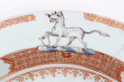 Lot 25 - Good quality 18th century Chinese famille rose armorial porcelain dish, the centre painted with coat of arms, surmounted by a hound on the border, with floral patterns and precious objects, 22.75cm...