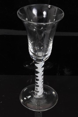 Lot 39 - 18th century wine glass, probably Dutch, the trumpet bowl on an opaque twist stem, 17cm height