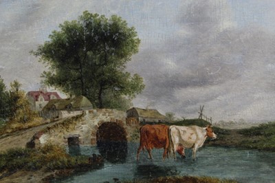 Lot 510 - 19th century English School, oil on panel, a river landscape with cattle watering by a bridge, unframed, 20 x 26cm