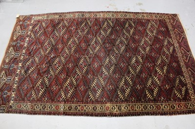 Lot 850 - Antique Tekke Turkoman rug, with claret field and repeat quartered medallion in geometric borders, 335 x 200cm