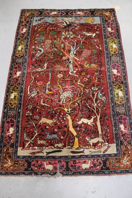 Lot 852 - Persian tree of life design rug