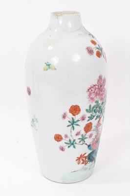 Lot 43 - Antique Chinese Qing period semi-eggshell porcelain vase with a textured surface, decorated in a famille rose palette with two hoho birds in a stream, surrounded by flowers and foliage, 26cm height