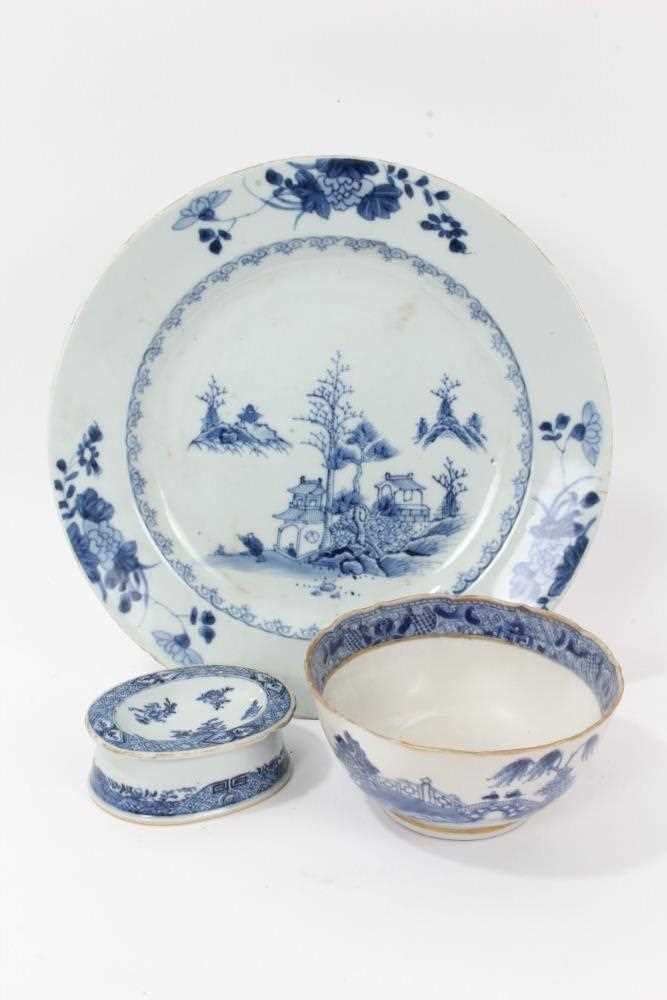 Lot 51 - Three pieces of 18th century Chinese blue and white export porcelain, including landscape painted dish and bowl, and a salt painted with floral sprays, the dish measuring 27.5cm diameter