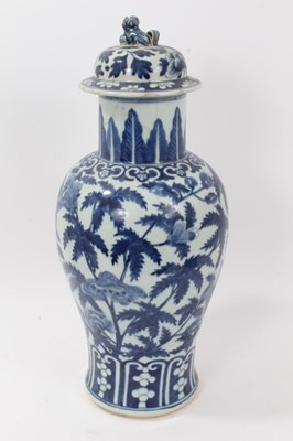 Lot 52 - Large antique late 19th century Chinese blue and white porcelain vase and cover, of baluster form, decorated with foliate patterns, the cover with foo dog knop, total height 48cm