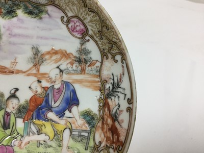 Lot 54 - Antique 18th century Chinese famille rose export porcelain saucer, painted in the Mandarin style with a figural scene, including a seated man having his feet washed, 15cm diameter