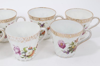 Lot 60 - Dresden china tea service, c.1920, of fluted form, painted with floral sprays, including ten coffee cups and saucers, fourteen tea cups and seventeen saucers, one jug, one slop bowl, one muffin dis...