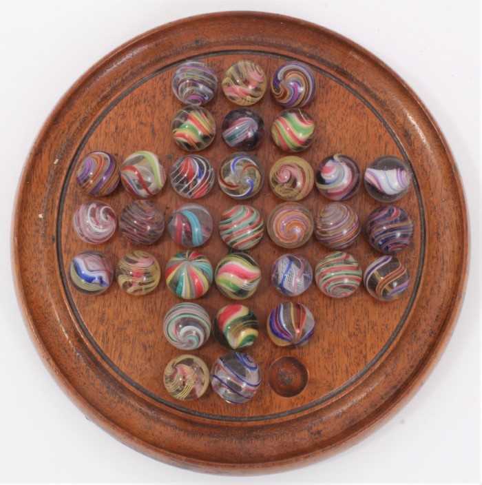 Lot 464 - Victorian glass marbles on a solitaire board