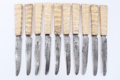 Lot 154 - Set of ten 19th Century steel bladed knives with fossilised mammoth tooth handles