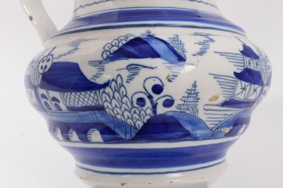 Lot 53 - 19th Century tin glazed pottery jug with blue and white chinoiserie decoration