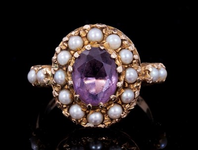 Lot 359 - Victorian-style 9ct gold amethyst and cultured pearl cluster ring with an oval mixed cut amethyst surrounded by a border of cultured pearls with further pearls to the shoulders on 9ct gold shank. R...