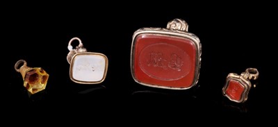 Lot 373 - Four early/mid 19th century seals with carved intaglios. Largest 34mm - smallest 16mm