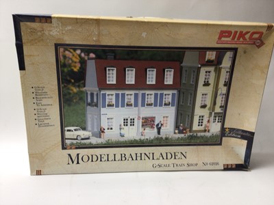 Lot 1599 - Railway LGB boxed and unboxed selection of buildings kits to include Piko LGB shop, town houses and others (qty