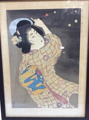 Lot 30 - Three antique Japanese coloured woodcuts depicting female figures, signed, in glazed gilt frames, 32.5cm x 23.5cm