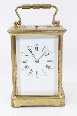 Lot 917 - Late Victorian repeating carriage clock with enamel dial, striking on gong in gilt brass case 17cm high