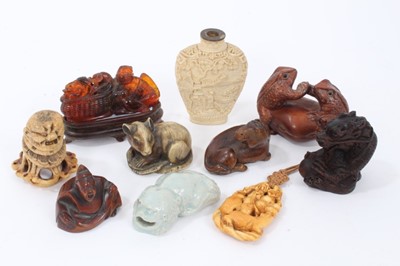 Lot 234 - Group of boxwood, bone and other Japanese netsuke and works of art