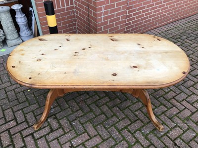 Lot 87 - Pine kitchen table on twin pedestal base joined by stretcher