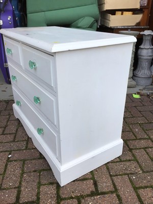 Lot 89 - Painted pine chest of two short and two long drawers with shaped glass handles