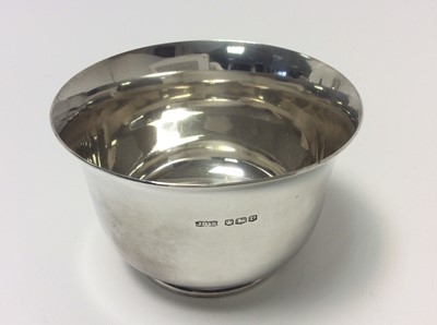 Lot 161 - George VI silver sugar bowl of circular form, with flared rim, (Sheffield 1946), maker James Dixon & Sons, together with a George V silver sugar bowl (Birmingham 1920), maker George Unite