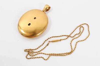 Lot 271 - Victorian yellow metal locket on 15ct gold chain