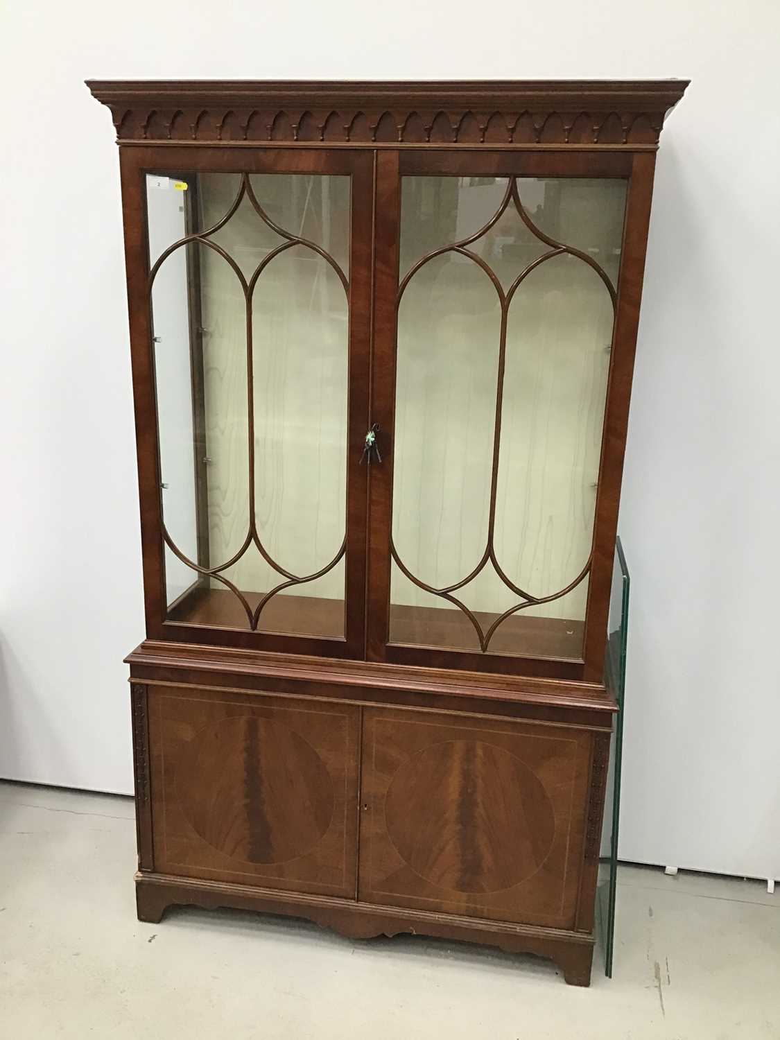 Lot 2 - Good quality George III-style mahogany two height display cabinet, the top enclosed by gothic astragal glazed doors with cupboards below