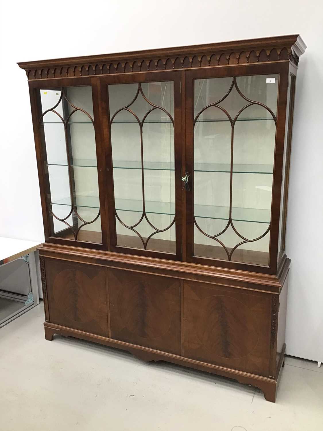 Lot 3 - Good quality George III-style mahogany two height display cabinet, the top enclosed by gothic astragal glazed doors with cupboards below