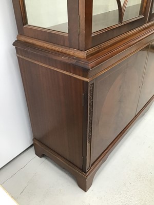Lot 3 - Good quality George III-style mahogany two height display cabinet, the top enclosed by gothic astragal glazed doors with cupboards below