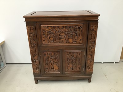 Lot 214 - Chinese carved wooden cocktail cabinet