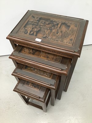 Lot 7 - Chinese carved wooden nest of three coffee tables