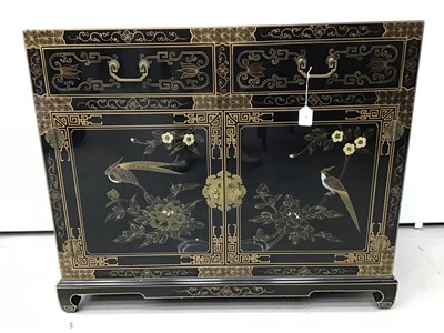 Lot 4 - Chinese black lacquered cupboard with chinoiserie gilded decoration, two drawers and cupboards below