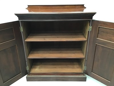 Lot 66 - Good quality Edwardian mahogany cupboard with dentil cornice, shelved interior enclosed by two panelled doors, 92cm wide x 107cm high x 47cm deep.