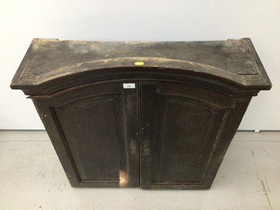 Lot 78 - 18th century French chestnut cabinet, arched form, e closed by pair of panelled doors, 81cm wide x 24cm deep x 106cm high
