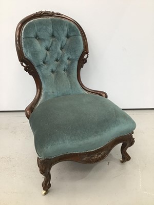 Lot 80 - Mid Victorian carved walnut upholstered spoon back chair