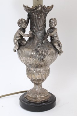 Lot 171 - Pair of silvered table lamps with putti