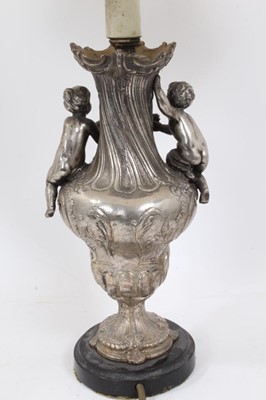 Lot 171 - Pair of silvered table lamps with putti