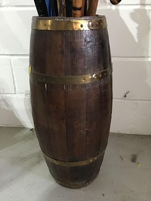 Lot 96 - 19th century brass bound coopered oak barrel, together with a collection of modern walking sticks etc