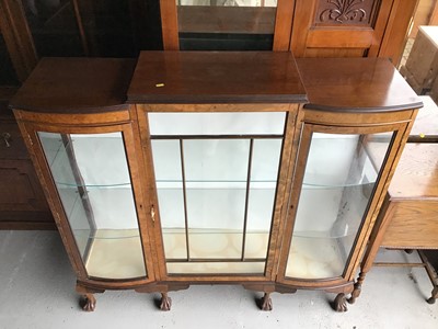 Lot 119 - 1930s walnut veneered display cabinet enclosed by three glazed doors with bowed glass panels on cabriole legs with ball and claw feet 134cm wide x 127cm high x 37cm deep
