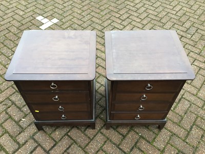 Lot 130 - Stag mahogany Minstrel bedroom furniture to include a pair of tall chest of drawers, pair of bedside chests of four drawers, and a long chest of drawers