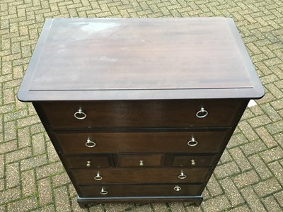 Lot 130 - Stag mahogany Minstrel bedroom furniture to include a pair of tall chest of drawers, pair of bedside chests of four drawers, and a long chest of drawers