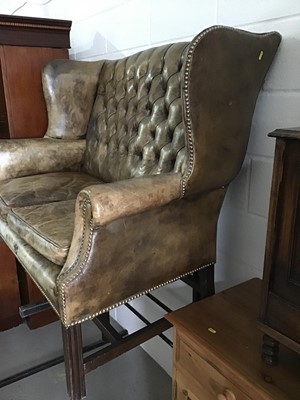 Lot 125 - Good quality Georgian style green leather wing back two-seater settee with buttoned back, loose seat cushions, brass studded edge on moulded square chamfered legs joined by stretchers, approximatel...