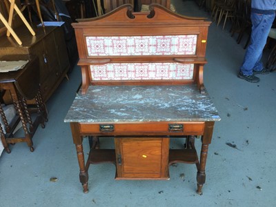 Lot 127 - Edwardian walnut washstand with with tiled back, marble top, drawer and cupboard below 88cm wide x 127cm high x 49cm deep