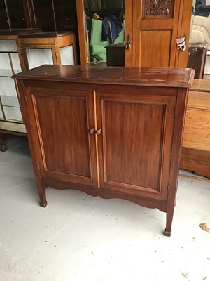 Lot 138 - Edwardian mahogany cupboard enclosed by two panelled doors on turned legs, 107cm wide x 106cm high x 37cm deep