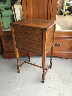 Lot 139 - 1930s oak needlework box on barley twist legs together with a footstool on cabriole legs with ball and claw feet