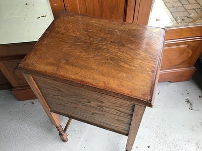 Lot 139 - 1930s oak needlework box on barley twist legs together with a footstool on cabriole legs with ball and claw feet