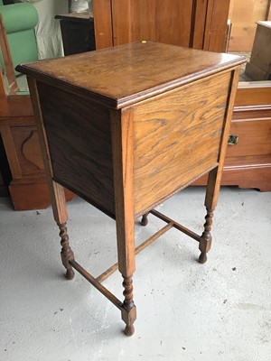 Lot 139 - 1930s oak needlework box on barley twist legs together with a footstool on cabriole legs with ball and claw feet