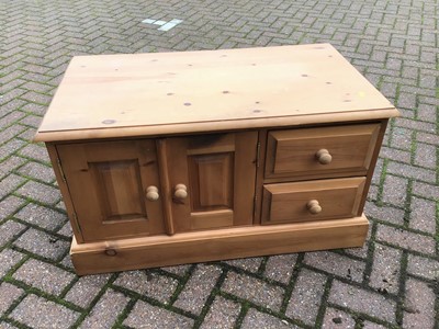Lot 142 - Pine low cupboard with two doors and two drawers, 91cm wide x 51cm high x 50cm deep