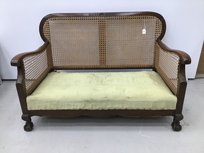 Lot 157 - 1920s / 30s bergere sofa, together with a ladder back elbow chair. (2)