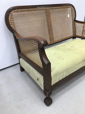 Lot 157 - 1920s / 30s bergere sofa, together with a ladder back elbow chair. (2)