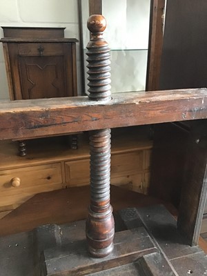 Lot 158 - Antique oak and fruitwood book press with turned wooden thread, approximately 86cm high